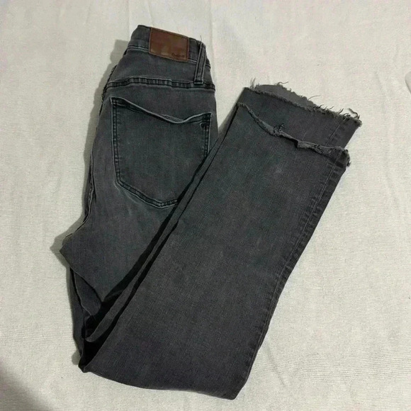 Madewell Denim - Madewell Cali Demi Boot Black Jeans. Fringed bottoms. 4 Button Fly.